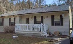 Located near two golf courses...Nice three bedroom rancher offers two full baths, eat-in kitchen, living room, laundry room, attic for extra storage. front and rear decks. This home is subject to third party approval and sold AS IS/WHERE IS. SIGN ON