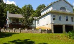 5 bedroom, 2 bath home on 3.16 acres in Berkeley Springs. Home has a family room, great room, eat-in kitchen, and unfinished basement. Property is landscaped and features a mountain view but home needs a little TLC. It will not qualify for USDA, FHA, or