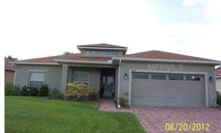 Beautifully decorated and immaculately maintained home in Lake Ashton Golf Community. Popular Hemingway model. Large great room with upgraded carpet, and has 3 sliding doors opening to the screened lanai. Sunshades on sliding doors and front door. Privac