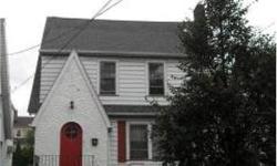 Spacious and comfortable home on one way street.Formal Dining Room, Living Room with fire place, and finished attic. Near elementary school, NY buses, and lite train station. Needs some TLC. Home subject to Bank's approval.Listing originally posted at