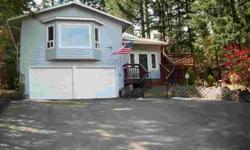 Maggie Lake Home painted inside and out. Perfect View of the Lake, best view without living on the water. Open concept updated kitchen. Access property from Lakeshore Drive and Belfair Tahuya Hwy. Basement has a lot to offer, could be Bonus room and third