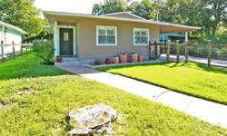 This 1949 Bungalow is less than 4 miles from downtown and just minutes away from South Congress! 502 Radam has an open floor plan that is great for entertaining. The kitchen has tile counters and a breakfast bar that overlooks the living room. This home