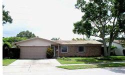 Home Warranty provided! Great 4 bedroom home in an incredible location, within a mile to all shopping, within walking distance of major Banks and Grocery Stores, Hardware Outlets, Clearwater and Countryside Malls, within 2 miles, Long Center (like a YMCA)