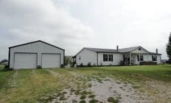 Immaculate and spacious double-wide manufactured home featuring 2 fireplaces, 3 bedrooms, 2 baths, living room and separate family room with wet bar, large back deck overlooking the above ground wimming pool, new metal roof in 2009 and plenty of space for