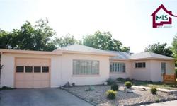 What a find! This flexible property is 1 and a half blocks from NMSU on an oversized lot with a 26 X 16 sq. ft. greenhouse. Zoned UD-TZ this can be a residence or place of business. Currently the three bedrooms are set up as two therapy/medical offices