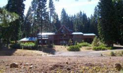 Come view this magnificent mountain home located in rural northern CA in Modoc County where the west still lives. This magnificent cedar home is a 4 Bdr/3.5 Bth, 3,151 sq. ft beauty with spacious living room with loft & bar, formal dining area, large