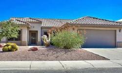 Fabulous Sun City Grand Madera with private backyard and the majority preferred south facing orientation. Interior features include new decorator beige paint throughout, tile in all but guest bedroom and den, Maple cabinets, separate French door exit from