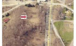 Corner lot at intersection of busy Route 9W and Milton Turnpike. Traffic light allows easy access in & out. Zoned Highway Development with a varience to use existing house as office space. House was recently rented for $1K per month + utilties. Some