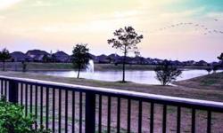 FOUNTAIN/WATERVIEW from family room & master bed & backyard with wrought iron fence, creek and paved jogging trail behind home. This 4 bed/2 bath layout features stone elevation with covered front porch, spacious bedrooms, plantation shutters, granite