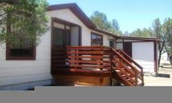 Perfect full time home or mountain get-a-away. This property has been recently repainted and and has been very well taken care of. Nice, flat, easy access lot in quite area just north of Ruidoso. A great shaded deck on the back for summer month's