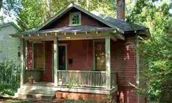 Enchanted cottage SO CLOSE to downtown, Greenlife. Walk to everything! Wonderfully cozy with 9-foot ceilings, exposed brick, stainless/silestone kitchen, swing on your covered front porch, back deck overlooks beautiful PRIVATE yard with mature trees--the