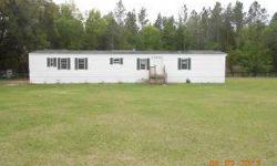 BUILD YOUR DREAM HOME HERE. CLEARED ten ACRES, 4-BOARD FENCING JUST BUILT. GREAT MOBILE ALREADY ON SITE. three BEDs, WITH A SPACIOUS LIVING ROOM AND KITCHEN. 4 PADDOCKS WITH WATER. ZONED A-1, SO BRING YOUR HORSES!Ocala Marion County Association of