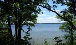 Gorgeous south facing Cass Lake lot with tremendous views, great trees, and 150' of sandy shoreline. Includes old house that is in tear-down condition. Do not enter.Listing originally posted at http