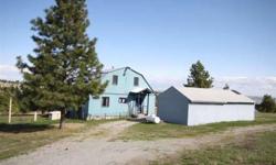 Three bedroom home with three bay large shop and separate garage detached on twenty very useable acres in Union Valley. There are only four 20 acre parcels on Wheatland Road and this is the third one on your left so you will not have much traffic rushing