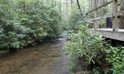 Adorable cabin with a deck overlooking a BEAUTIFUL wide rushing creek. Borders USFS. Park like setting. Hurry this 1 won't last long! Completely furnished.Listing originally posted at http