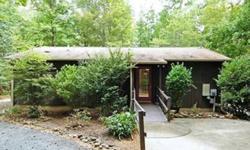 Nestled in the trees on 2.4 acres. One level with large screened porch. Open floor plan. Newly remodeled kitchen and baths. Bamboo flooring. Tan minute drive to Carrboro or Chapel Hill, yet easy access to I-40. Fenced pet area and room to roam. Great
