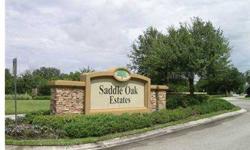 5.4 ACRE LOT IN SADDLE OAK ESTATES. Choose your own custom builder and build whenever you want. Lot is almost rectangular in shape (390' x 605' x 381' x 531') and offers a very nice location to build your dream home in a country setting. Only about 6 mile