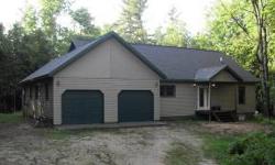 Spacious 2200+ s/f home on 1.6 acres with access to 800' of sugar sand Lake Michigan beach! Built in 2006, this home features an open floor plan with large great room and hardwood flooring plus a spiral staircase to an open loft area. This main floor