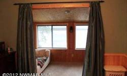 Enjoy wonderful sunsets at this completely remodeled cabin on Silver Lake. Year-round cabin is set just feet from the water on sand beach. Large garage, sauna, two bedrooms and spacious kitchen and laundry. Let the fun begin at this special lakeside