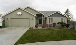 Stunning Kennewick Park Rambler situated on a cul-de-sac. Large open spaces maximize natural light. Beautiful, new Brazilian Hardwood flooring throughout. New updated kitchen, cabinets and paint. Kitchen is open to dining and living rooms, great for