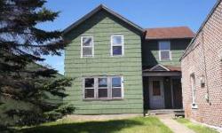Income opportunity located in downtown Manistique! This 2 unit apartment home could be a great rental unit or live in one half and have the renter pay your mortgage! The downstairs unit has 1 bedroom and the upstairs unit has 2 bedrooms. With some TLC you