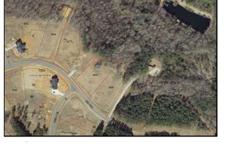 NEIGHBORS WALK SUBDIVISION LARGE LOTS FROM .51 -.98 ACRES WITH BEAUTIFUL WOODED BUFFER*QUIET COUNTRY LIVING*CLOSE TO RALEIGH AND HWY64/HWY264*BRICK FRONT HOMES WITH SCREENED IN PORCH AND GARAGE*5 MILES TO MUDCATS 5 COUNTY STADIUM*20 MINUTES TO