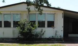 This is a 1983 doublewide for $18500 with 2/2 and 1440 SqFt. This home is very large with a carport, shed, screened in front patio, and is very open. It's a 40+ community, pool access, and pets ok. 727-807-7088