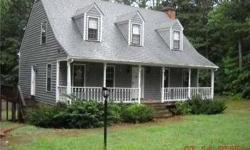 Cozy cape. Three bedrooms, two and a half baths. Gas fireplace. Front porch and rear deck. Listing agent and office