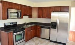 This 3 bedroom, 2.5 bathroom brick and framed split level has just undergone a full renovation. We've added granite counters, stainless steel appliances, new cabinets and ceramic tile in the kitchen. Brand new hardwood floors in the living and dining