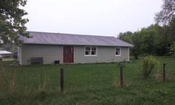 4 outbuildings with 3 wells. Nice large pond. Many updates in 2012 include siding, front/back doors, roof, Fascia and gutters. Full plus bathroom. 30x99 barn with new steel roof, Anderson windows. Land is set up for pasture or hay crop with fruit trees,