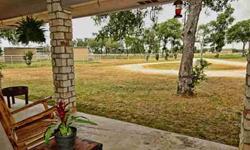 Would you enjoy peaceful country living within 30 minutes of downtown Austin? Sit on your large covered front porch & relax, enjoy room for family, pets, horses. Almost 3 acres, great barn wt. 3 outdoor horse runs, pipe fencing, hay storage,tack rm. House