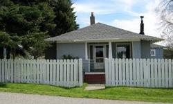 Charming Bungalow On 2.69 "Level" and Cross-Fenced Acres. Mountain and Stunning Territorial Views in the Heart of the "Glenrose Valley" (Upper South Hill.) Just Minutes From Manito Park, This Wonderfully Kept Property Is Perfect For Horses. Home Includes