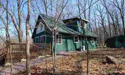 If you've been looking for a stupendous cabin in the woods with lake access, a cottage motif & nothing but mother nature around you...take a look here! TOTALLY updated 3BR/2BA cottage at Lake Redstone on 1.39 acres features wood laminate flooring, 2 story