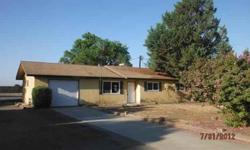 This is a rare find sitting on nearly half an acre of property. This home features 3 bedrooms, 2 baths, large laundry room, dining room and is loaded with potential. The over sized shop is great for toys and hobbies and also features covered carport,
