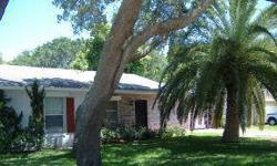 CHARMING, CENTRALLY LOCATED, 2 BEDROOM, 2 BATH IN NEW SMYRNA BEACH. CLOSE TO THE BEACH, ONE OWNER, AND LOVINGLY MAINTAINED. OPEN FLOOR PLAN THAT OPENS ONTO FLORIDA ROOM MAKES THIS HOME PERFECT FOR ENTERTAINING. LARGE LAUNDRY ROOM, FENCED YARD AND