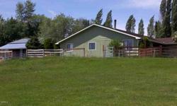 Great horse setup & a great home w/fam room & great rm. Sliders to covered patio & fenced yard. Barn has 3 stalls, hay storage, tack rm & loafing sheds. Irrg. pasture & round pen & electric waterer. Buyer to verify sq footage. Hot fence on property.