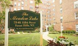Largest 1 Bedroom Line In Building W/ Corner View. Quiet Tree Lined Streets Of Forest Hills. This Apartment Features Hardwood Floors Throughout, Spacious Living Room With Dining Area. Both Kitchen & Bathroom Has Window. Doorman, Garage Zoned To P.S. 196