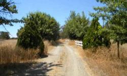 52 acres zoned for agriculture or residential. Rolling foothills with oak trees. For sale by owner/agent. Grapes, olive trees, horses, etc.??