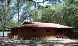Bring the horses! Beautiful secluded property on almost 3 acres!Comfortable home has four bedrooms, two baths and inside laundry room. Huge deck on rear of home for those large family gatherings! Storage shed in addition to steel frame work shop with