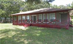 Wide open waterfront location for this charming two bdr,two bathrooms stucco home on lake tawakoni!recently up-to-date,this home is ready for entertaining and fun lake getaways!open living,dining & kitchen area overlooks the lake and porch the length of