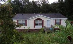 Private setting, priced below tax value! 2002 Manufactured home located on 1 acre in River Crest subdivision. Living room and bedrooms have carpet, kitchen, laundry and baths have vinyl flooring. Master bath has double vanity, garden tub/shower combo, and