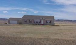 This is a very attractive rural home with the backdrop of the mountains right off the large deck. Nice large kitchen with center island, laundry/mud room as you enter the back door, 3 large bedrooms & a full unfinished basement for expansion. If you've