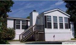 Enjoy being right on the water at 2935 Money's Bend Road. 2001 28 x 48 Mobile home with 14 x 14 Sunroom Addition. City water, sewer and garbage. 3 Bedrooms, 2 baths, Master over looks the lake. Large kitchen w/eat in dining area complete with appliances.