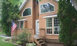 Beautiful 3 bedroom chalet nestled on a wooded level acre
