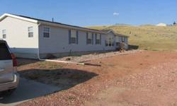 Great manufactured home with 4 bedrooms, 2 bathrooms, large master bedroom with retreat area, 32x36 garage, all on 2.5 acres. Call Steve Laakso 680-4956 or go to wwww.RoamingWyoming.com for more details.Listing originally posted at http