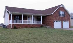 HUGE kitchen/dining combo w/ french door refrigerator, gas stove, island & pot rack. Master suite w/ whirlpool tub & seperate shower. Hardwood floors in Greatrm & Master Bedrm. Greatrm w/ bay window & fireplace. Frog room, large yard, porch/deck, more