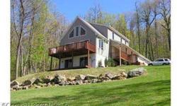 Fantastic Chalet on over 3 wooded Ac./with BREATH TAKING VIEWS and privacy!! Soaring great room w/ lots of windows! Private master suite on uipper level w/ large loft! Huge lower level family room, excercise area/ and or den, for what ever your needs