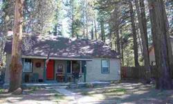 The PERFECT Tahoe Cabin! This adorable 4 bedroom, 2 bath house is located just minutes from the Lake, Heavenly, and Ski Run Shops and Restaurants. This home features a large open family room with over sized open rock fireplace, a great updated kitchen
