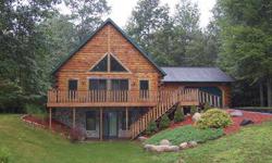 Log home living at its best! Year around home featuring 3 bedrooms, 2 1/2 baths full of warmth and charm providing you with that up north cabin feel year around. Home offers a view of lake and is located within walking distance to boat docking area.