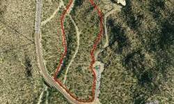 MOTIVATED Bank Owned Lot For Sale in Saguaro Ranch. Fully improved lot with paved streets, water, electric, phone, and gas. Septic required. The driveway is already cut to a relatively flat building envelope, which is bordered by beautiful rock formations